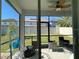 Relaxing screened porch with patio furniture at 14154 Dove Hollow Dr, Orlando, FL 32824