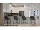 Modern kitchen features a breakfast bar and stainless steel appliances at 2726 Oxymoron Way, Kissimmee, FL 34746