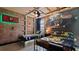 Harry Potter themed bedroom with twin beds, Hogwarts house bedding, and mural at 2726 Oxymoron Way, Kissimmee, FL 34746