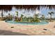 Community lazy river with a fun water feature at 2726 Oxymoron Way, Kissimmee, FL 34746