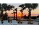 Stunning sunrise view over the community with hammocks at 3020 Mahalo Dr, Davenport, FL 33897