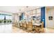 Formal dining room features a long table for large gatherings at 3020 Mahalo Dr, Davenport, FL 33897