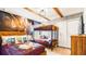 Themed bedroom with a full-size bed and bunk beds, featuring Harry Potter wall art at 3020 Mahalo Dr, Davenport, FL 33897