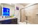 Charming bathroom with granite vanity, shower, and Frozen theme at 3020 Mahalo Dr, Davenport, FL 33897