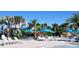 Resort-style pool with waterslide and lounge chairs at 3020 Mahalo Dr, Davenport, FL 33897
