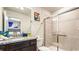 Well-appointed bathroom with granite vanity and walk-in shower at 3020 Mahalo Dr, Davenport, FL 33897