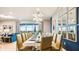 Bright dining room with a large table and stylish decor at 3020 Mahalo Dr, Davenport, FL 33897