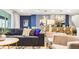 Spacious living room with sectional sofa and adjacent dining area at 3020 Mahalo Dr, Davenport, FL 33897