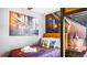Harry Potter-themed bedroom with a twin bed and bunk bed, showcasing magical artwork at 3020 Mahalo Dr, Davenport, FL 33897