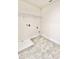 Laundry room with tile flooring and ample shelving at 3654 Sagefield Dr, St Cloud, FL 34773
