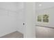 Large walk-in closet with wire shelving at 95 Malauka Place Trak, Ocklawaha, FL 32179