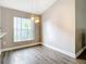 Bright dining area with hardwood floors and natural light at 2124 Fish Eagle St, Clermont, FL 34714