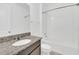 Clean bathroom featuring granite vanity and shower/tub combo at 5115 Lake Hamlin Trl, Winter Garden, FL 34787