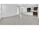 Bright living room with tile floors and access to the kitchen at 5115 Lake Hamlin Trl, Winter Garden, FL 34787