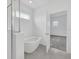 Modern bathroom with soaking tub and view of bedroom at 5115 Lake Hamlin Trl, Winter Garden, FL 34787