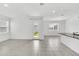 Bright dining area with tile floors and access to the backyard at 5115 Lake Hamlin Trl, Winter Garden, FL 34787