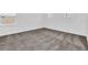 Bright bedroom with neutral carpeting and two windows at 5115 Lake Hamlin Trl, Winter Garden, FL 34787
