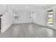 Spacious living room with tile floors and plenty of natural light at 5115 Lake Hamlin Trl, Winter Garden, FL 34787