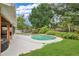 Inviting kidney-shaped pool with lush landscaping at 603 Antilla Ave, Altamonte Springs, FL 32714
