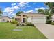 Charming two-story home with landscaped yard and attached two-car garage at 603 Antilla Ave, Altamonte Springs, FL 32714