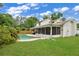 House with large backyard, pool and lush landscaping at 603 Antilla Ave, Altamonte Springs, FL 32714