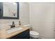 Small bathroom with a pedestal sink and brick feature wall at 603 Antilla Ave, Altamonte Springs, FL 32714