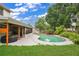 Charming backyard with pool and hot tub at 603 Antilla Ave, Altamonte Springs, FL 32714