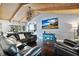 Spacious living room with vaulted ceilings, dark hardwood floors, and a large sectional sofa at 603 Antilla Ave, Altamonte Springs, FL 32714