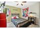 bedroom with full-size bed and themed wall decor at 603 Antilla Ave, Altamonte Springs, FL 32714