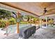 Relaxing screened patio with pool, hot tub, and grill at 603 Antilla Ave, Altamonte Springs, FL 32714
