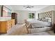 Spacious bedroom with plush carpeting, large bed, and ample dresser storage at 603 Antilla Ave, Altamonte Springs, FL 32714