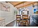 Dining area with wood floors, chandelier, and view into living room at 603 Antilla Ave, Altamonte Springs, FL 32714