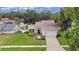 Attractive single-Gathering home with a landscaped yard and driveway at 603 Antilla Ave, Altamonte Springs, FL 32714