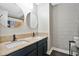 Modern bathroom with double vanity and geometric wallpaper at 603 Antilla Ave, Altamonte Springs, FL 32714
