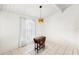 Bright dining area with a drop-leaf table and large window at 200 Maitland Ave # 174, Altamonte Springs, FL 32701
