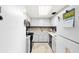 Updated kitchen with white cabinets, granite countertops, and black appliances at 200 Maitland Ave # 174, Altamonte Springs, FL 32701