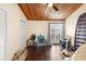 Bedroom with wood floor, window, and closet at 200 Maitland Ave # 174, Altamonte Springs, FL 32701