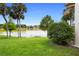 Backyard with lake view and lush green grass at 200 Maitland Ave # 174, Altamonte Springs, FL 32701