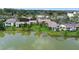 Waterfront community with multiple condo buildings and lush landscaping at 200 Maitland Ave # 174, Altamonte Springs, FL 32701