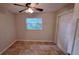 Bright bedroom with ceiling fan and tile flooring at 1030 Gregory Dr, Maitland, FL 32751