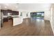 Kitchen with dark cabinets and granite countertops at 7574 Marker Ave, Kissimmee, FL 34747