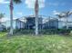 Private backyard oasis with a screened pool at 7574 Marker Ave, Kissimmee, FL 34747