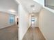 Bright entry hall with tile flooring, leading to other rooms at 7574 Marker Ave, Kissimmee, FL 34747