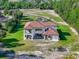 Luxury home with tile roof, patio, and expansive backyard at 2490 Zuni Rd, St Cloud, FL 34771