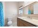 Well-appointed bathroom with a vanity and shower/tub combo at 2490 Zuni Rd, St Cloud, FL 34771