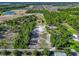 Aerial view showing a large lot with a house and surrounding community at 2490 Zuni Rd, St Cloud, FL 34771