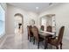 Bright dining room featuring a formal table and access to the kitchen at 2490 Zuni Rd, St Cloud, FL 34771