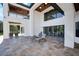 Spacious paved patio with lounge chairs, offering ample outdoor living space at 2490 Zuni Rd, St Cloud, FL 34771