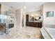 Elegant Primary bathroom featuring a soaking tub and double vanity at 2490 Zuni Rd, St Cloud, FL 34771