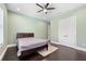 Charming bedroom with light-green walls and ceiling fan at 2490 Zuni Rd, Saint Cloud, FL 34771